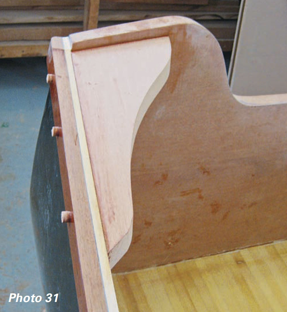 Wooden quarter knee is held in place by epoxy and fastenings.