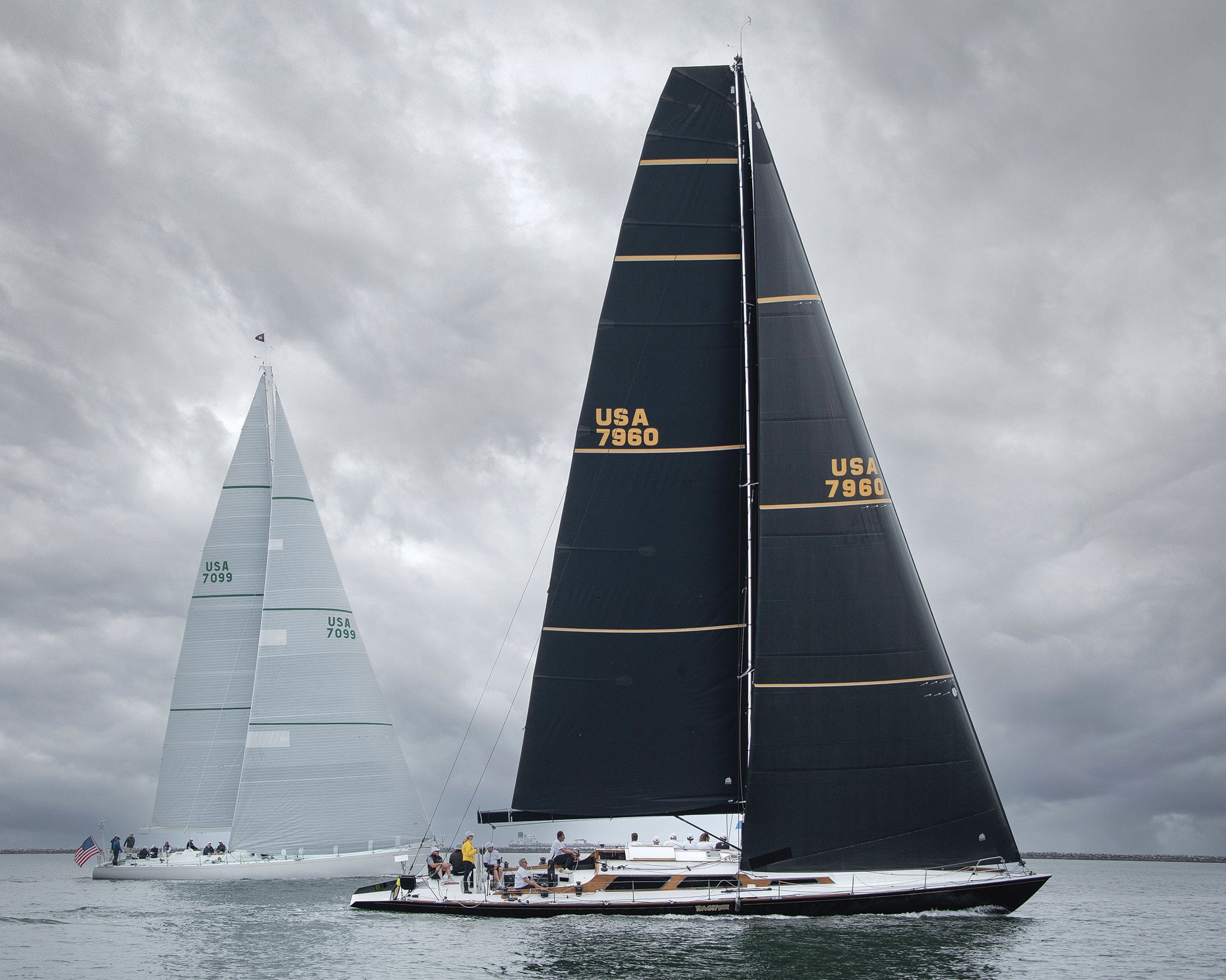 Two sailing yachts in the ocean.