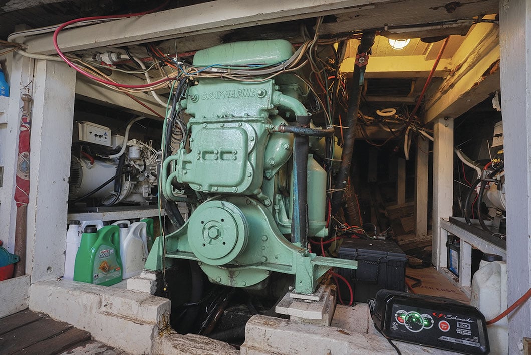Gray engine in the hull of a boat.