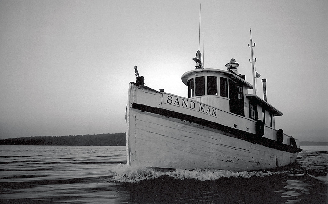 The tugboat SAND MAN.